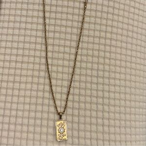 Gold Pendant Necklace with Floral Design